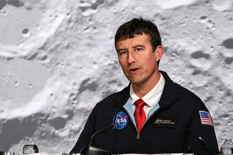 NASA flight director Rick Henfling speaks during a status briefing of the Artemis II crewed lunar mission at Johnson Space Center in Houston, Texas, on April 7, 2026. After completing their lunar flyby -- breaking the record for distance from Earth -- the Artemis II crew is bound for home, with splashdown due in the Pacific off the coast of California late April 10. 