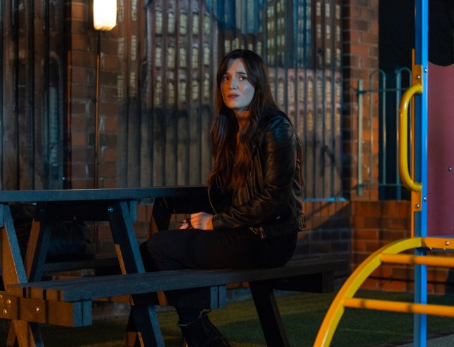 Jodie Ramsey sits on the swings in the precinct.