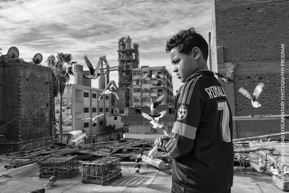 Awady, who was born with asthma, raises pigeons as a hobby. “Every day, I am afraid I won’t be able to play football again,” he says. Alexandria, Egypt, 14 February 2018.