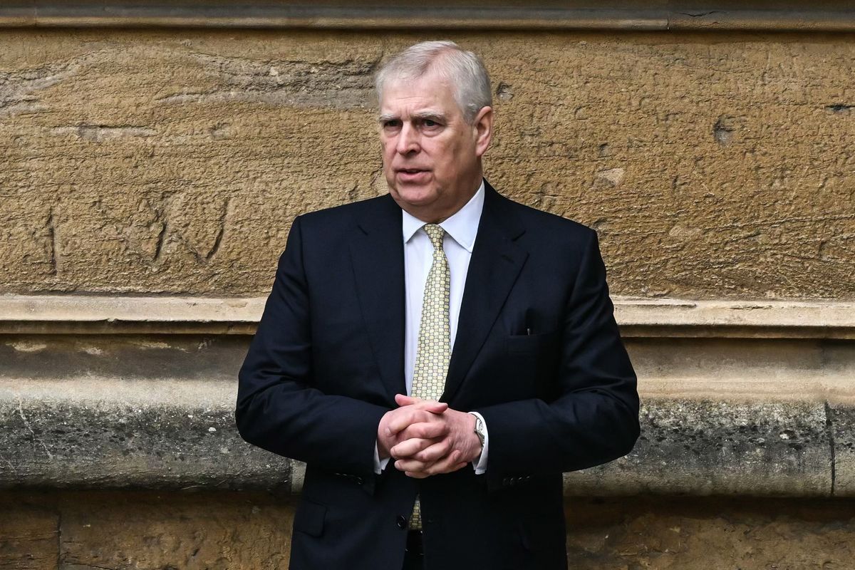 Andrew reacts as he arrives at St. George's Chapel, Windsor Castle