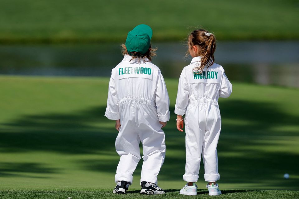 Golf - The Masters - Augusta National Golf Club, Augusta, Georgia, U.S. - April 8, 2026
England's Tommy Fleetwood's son Frankie and Northern Ireland's Rory McIlroy's daughter Poppy during the par 3 contest REUTERS/Mike Blake