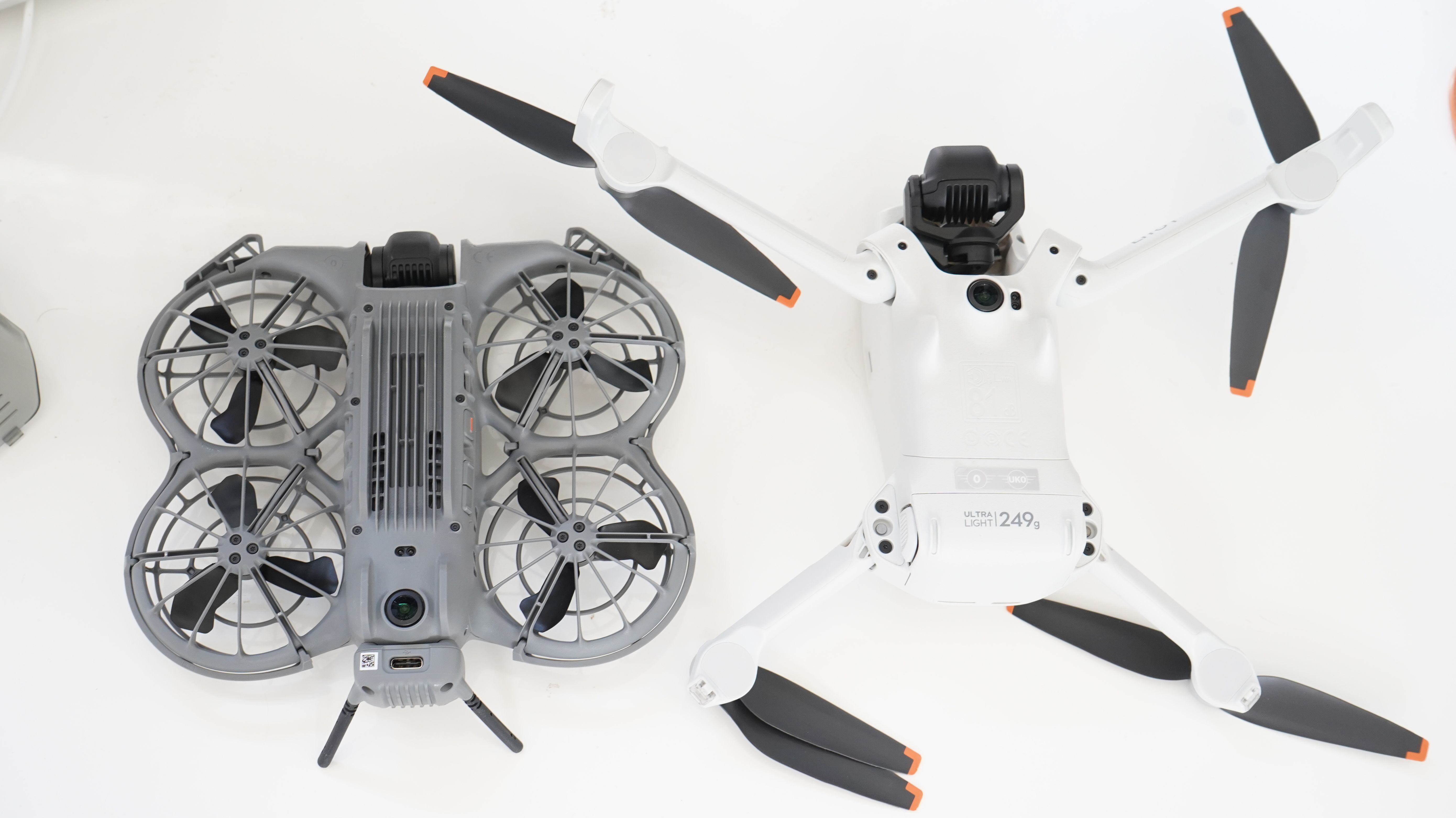 DJI Neo and DJI Lito next to each other on their backs