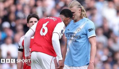 Gabriel appears to push his head into the face of Erling Haaland during the Premier League match between Manchester City and Arsenal at Etihad Stadium