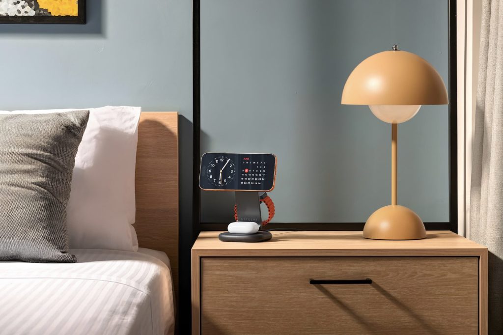 A lamp next to a bed