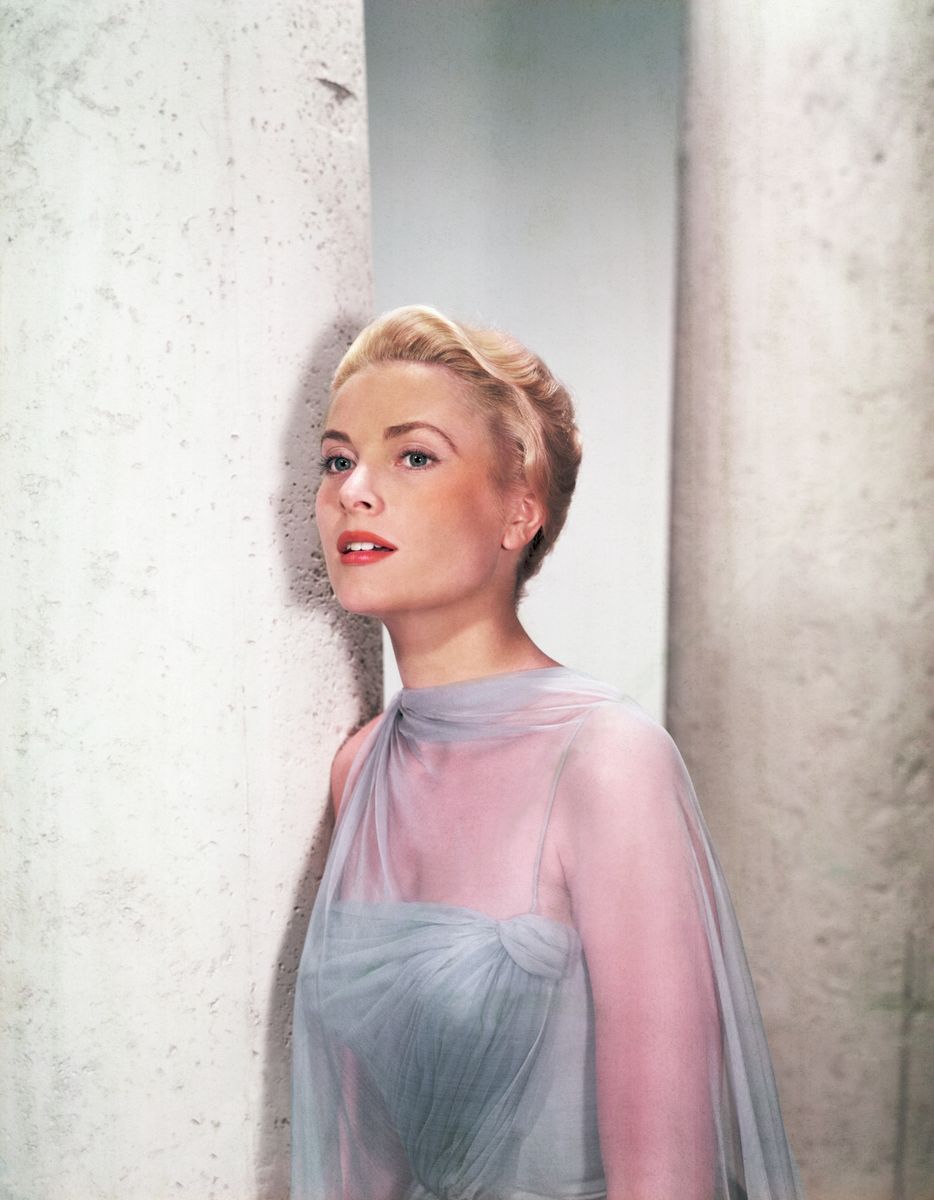 Grace Kelly wearing a light blue evening gown designed for her by Edith Head, for the 1955 film, 'To Catch a Thief'.