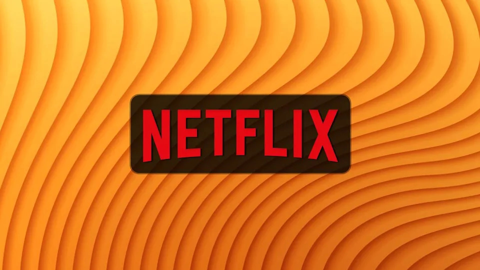 Netflix logo on a yellow orange background.