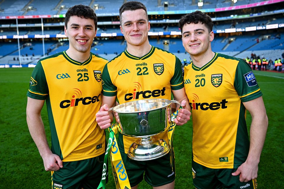 Donegal players (l-r) Kevin Muldoon, Seán Martin and Seanan Carr celebrate league success - but will Kerry turn the tables in the championship? Photo: Sportsfile