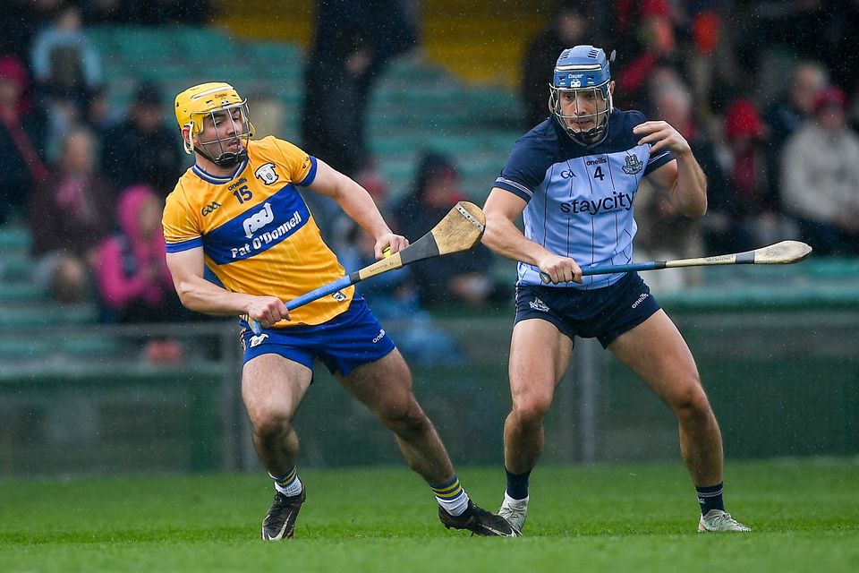 Clare's Mark Rodgers in action against Eoghan O'Donnell of Dublin. Rodgers hit 0-12 but withdrew through injury. Photo: John Sheridan/Sportsfile