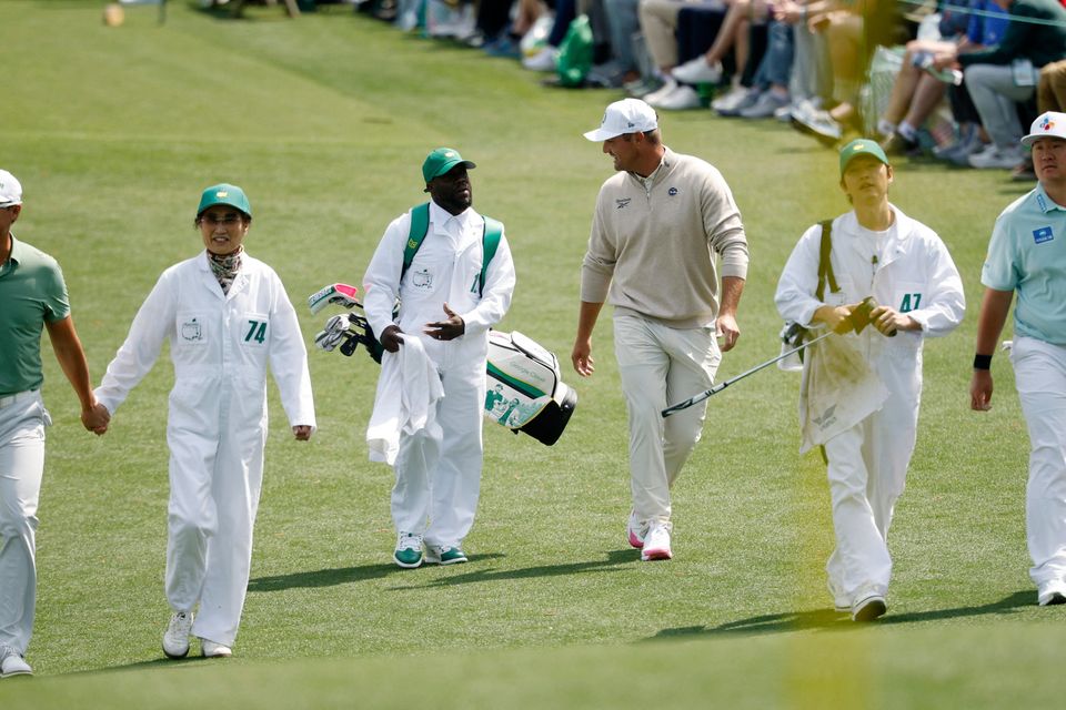 Golf - The Masters - Augusta National Golf Club, Augusta, Georgia, U.S. - April 8, 2026
Bryson DeChambeau of the U.S. with his caddie, actor and comedian Kevin Hart, on the 2nd hole during the par 3 contest REUTERS/Brian Snyder