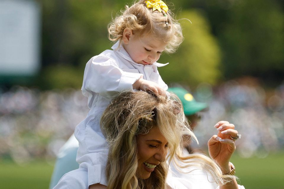 Golf - The Masters - Augusta National Golf Club, Augusta, Georgia, U.S. - April 8, 2026
Wife of Spain's Jon Rahm, Kelley Cahill, with their daughter Alaia Rahm during the par 3 contest REUTERS/Brian Snyder