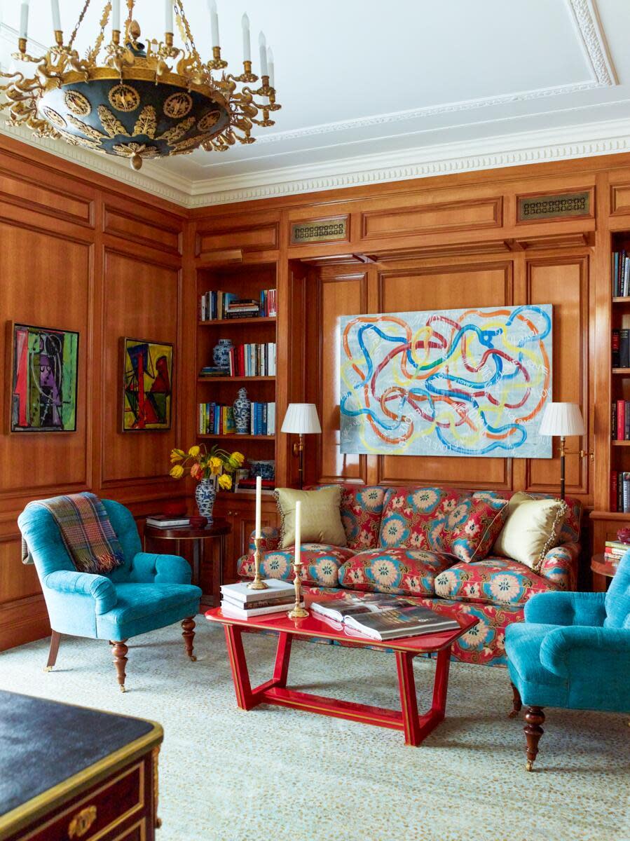 Cozy living room with colorful furniture and artwork