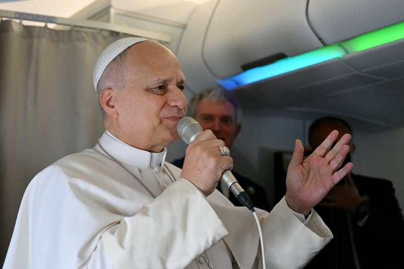Pope Leo XIV addresses journalists on a flight heading to Algiers on Monday. Photograph: Alberto Pizzoli/AFP via Getty Images