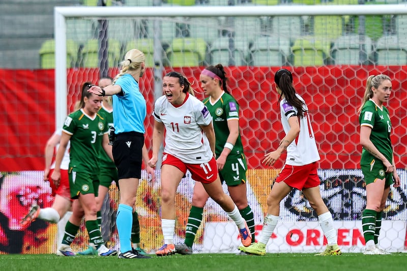 Tanja Pawollek celebrates scoring Poland's opening goal. Photograph: Ryan Byrne/Inpho

