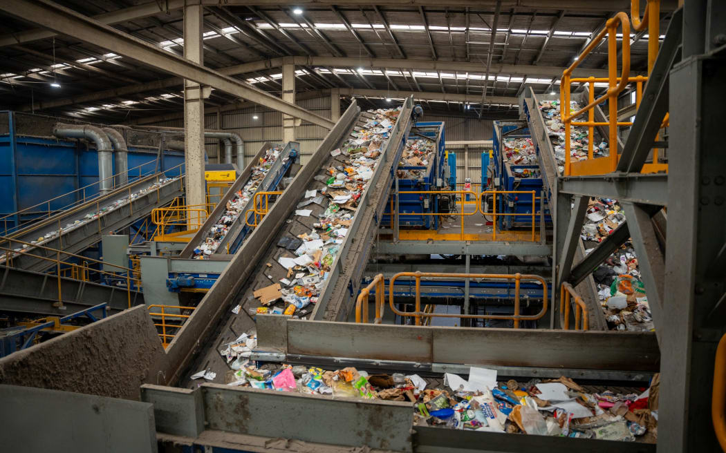 At the Auckland Material Recovery Facility in Onehunga, the automated machinery sorts the recycling by material type.