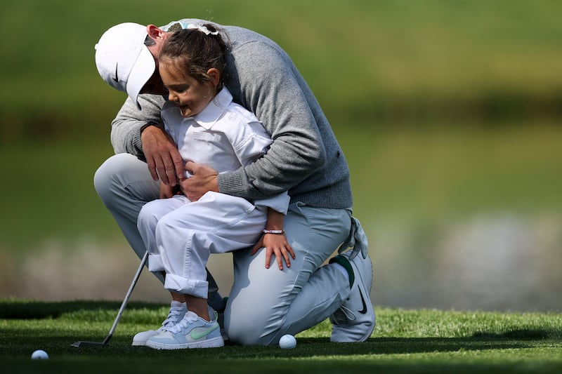 Rory McIlroy with his daughter Poppy during the par-three contest prior to the 2026 Masters at Augusta National Golf Club, Georgia. Photograph: Jared C. Tilton/Getty Images