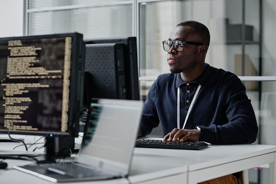AI engineer looking at stocks.