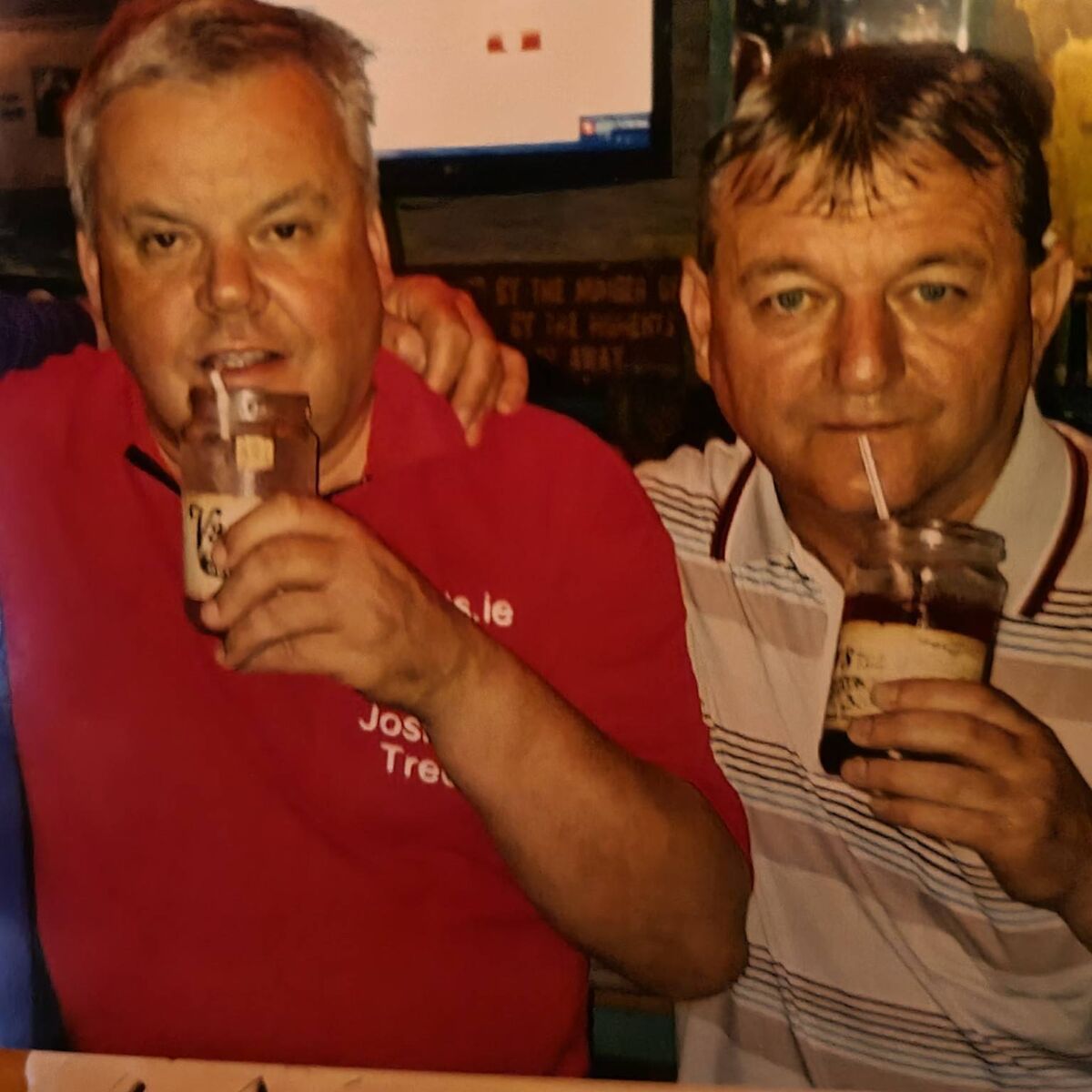 Sean Leahy with his great friend, the late John Dinnybobs McCarthy enjoying a drink at the Joshua Tree.