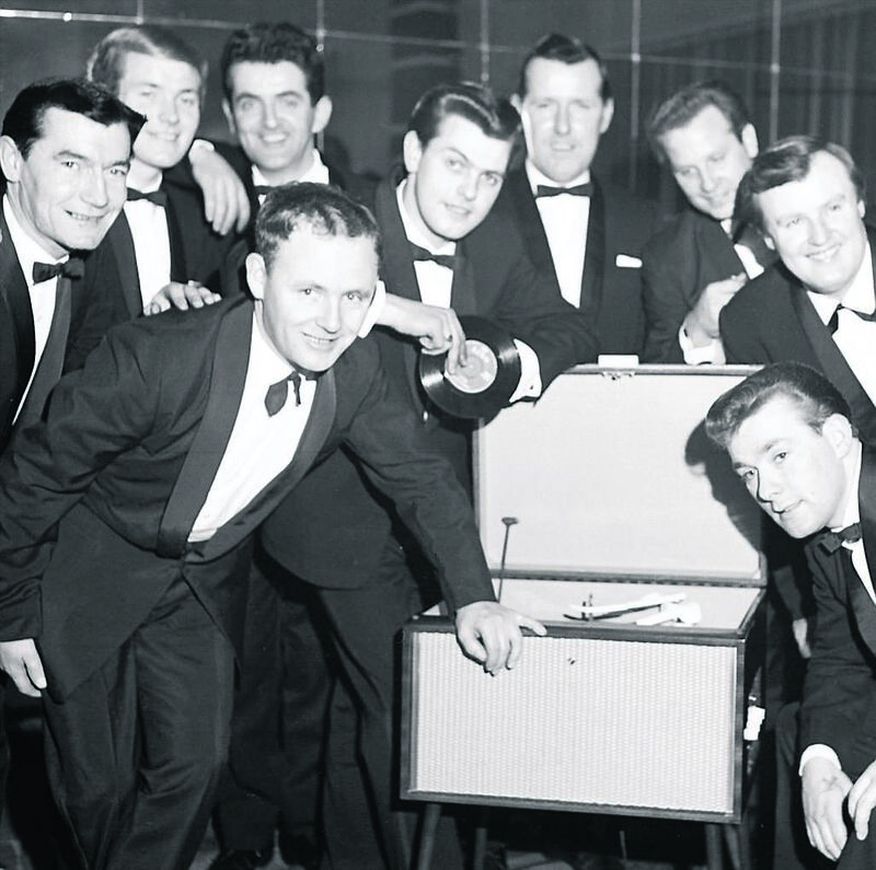 The Regal Showband, Cork, listen to their first recording, Love Me, in November, 1964, with their manager Paddy Kennedy and band leader John Minehane