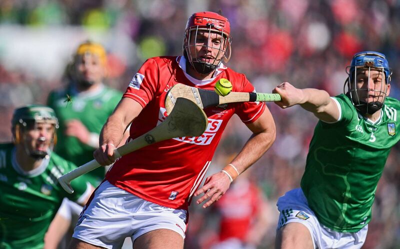 Cork's Brian Hayes tries to get away from Mike Casey of Limerick. Picture: Piaras Ó Mídheach/Sportsfile