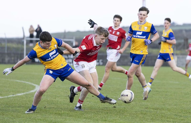 Clare's Daniel Brady and Cork's Dara Sheedy in action during the Munster U20 match last evening. Picture: Eamon Ward