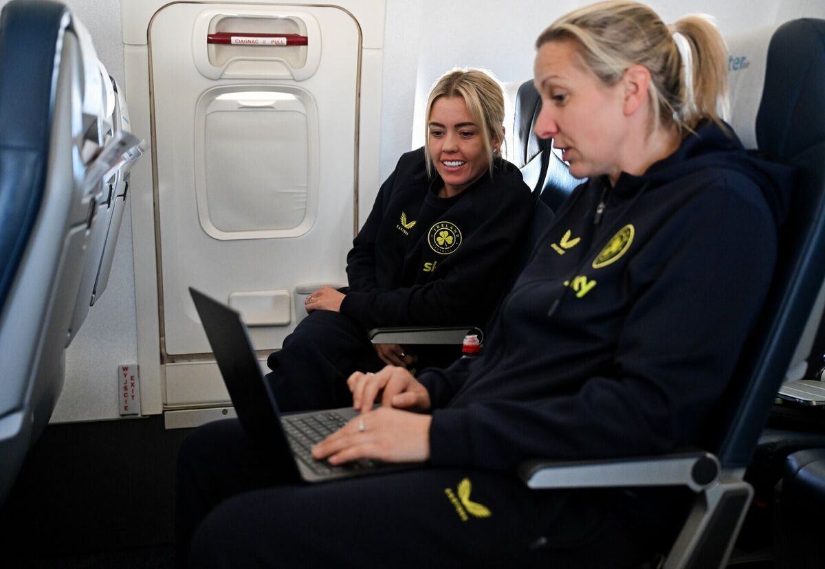Republic of Ireland head coach Carla Ward with Denise O’Sullivan during their flight to Dublin from Gdansk. Pic: Stephen McCarthy/Sportsfile