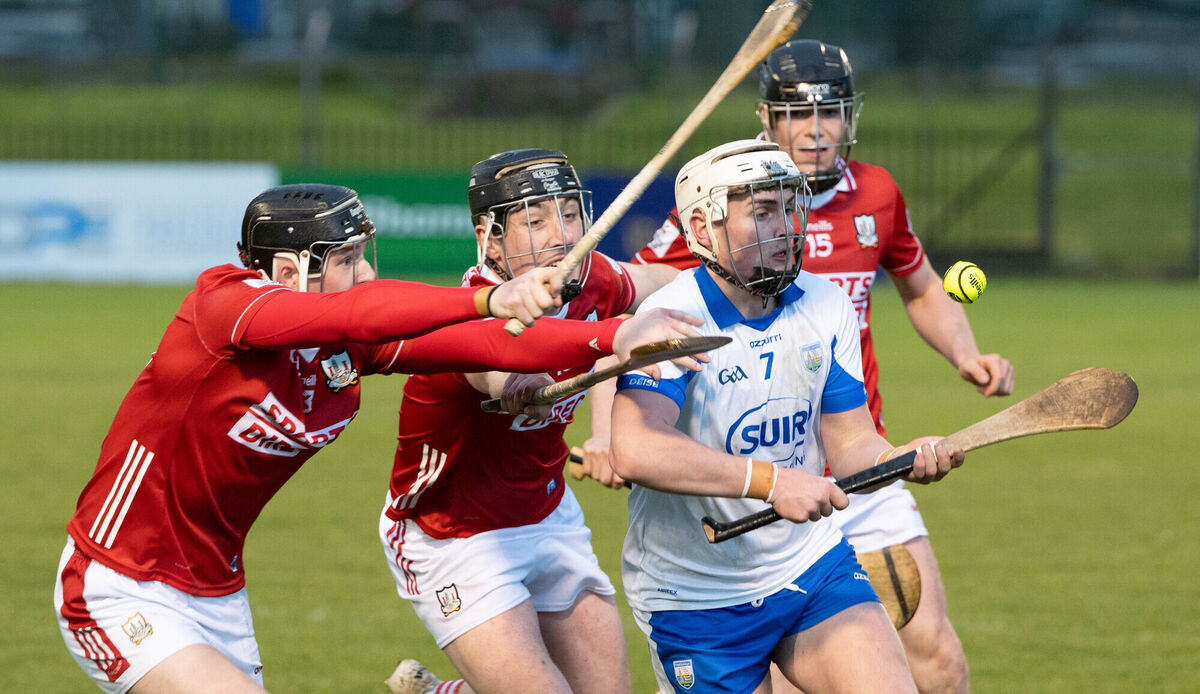 Cork players Finn O'Brien and Zack Biggane pressure Waterford's Cathal O'Sullivan. Picture: Howard Crowdy
