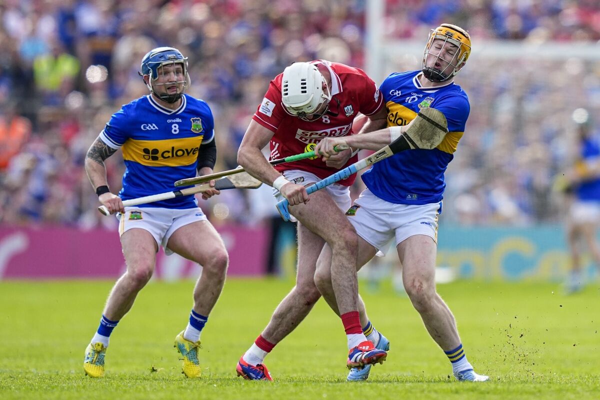 Tim O'Mahony of Cork and Jake Morris of Tipperary clash on Sunday. Picture: INPHO/James Lawlor