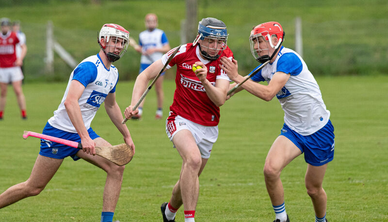 Cork's Leo Hennessy tries to battle his way past Waterford's Conor Power and Joseph McDonnell during the Fulfil Munster U20HC game at Cappoquin Logistics Fraher Field a fortnight ago. Picture: Howard Crowdy