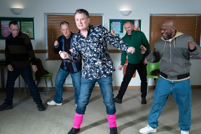 Ross, Howie, Alfie, Harvey and Ian rehearse a dance in a scene from EastEnders