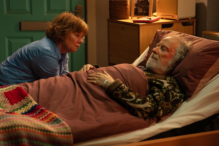 557225,TITLE:Eastenders Nigel Bates in bed with Julie by his side in EastEnders.