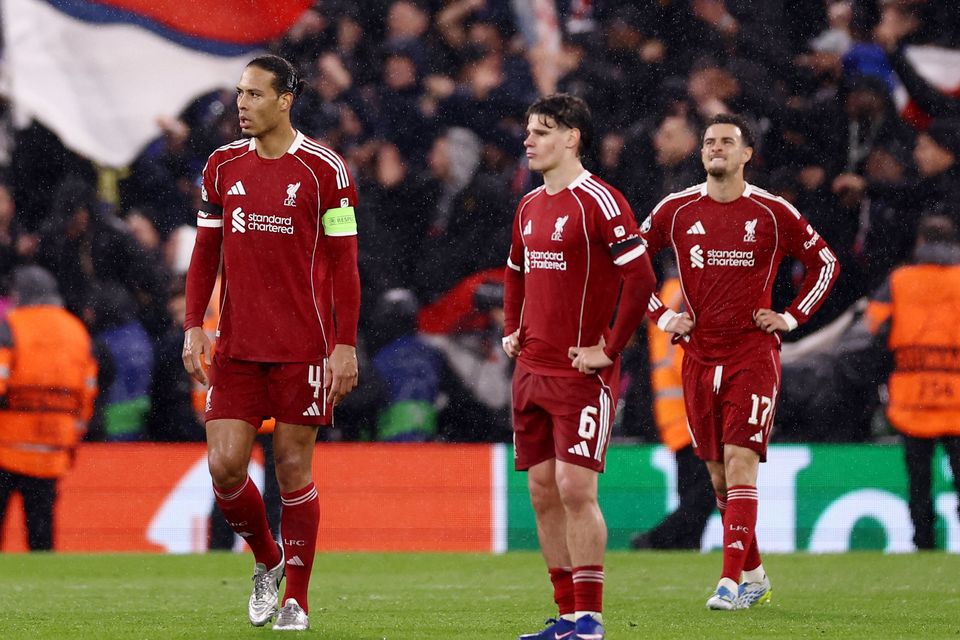 Liverpool's Virgil van Dijk and Milos Kerkez look dejected after Paris St Germain's Ousmane Dembele scores their second goal Action Images via Reuters/Lee Smith