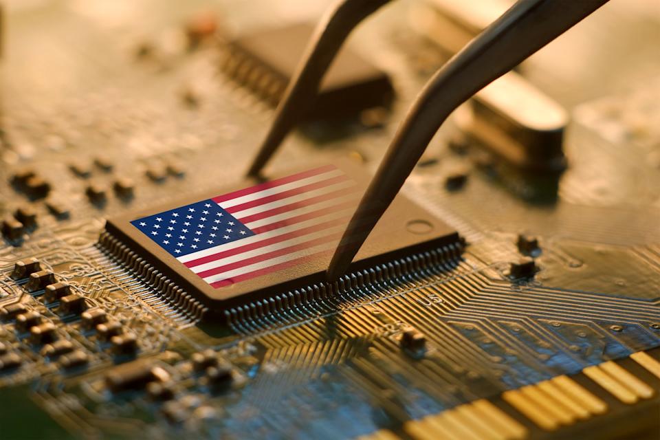 A rendering of a chip with an American flag on it. 