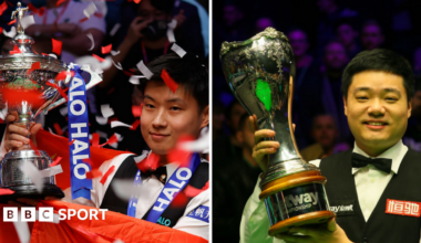 Zhao Xintong (left) with the World Championship trophy and Ding Junhui with the UK Championship trophy