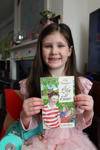 Lily holding The Summer of Lily and Esme. Photograph: Fiona Ellis