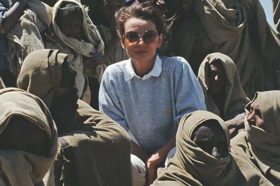 Audrey Hepburn with local women on her first field mission for UNICEF in Ethiopia (1988).Credit: Derek Hudson/Getty