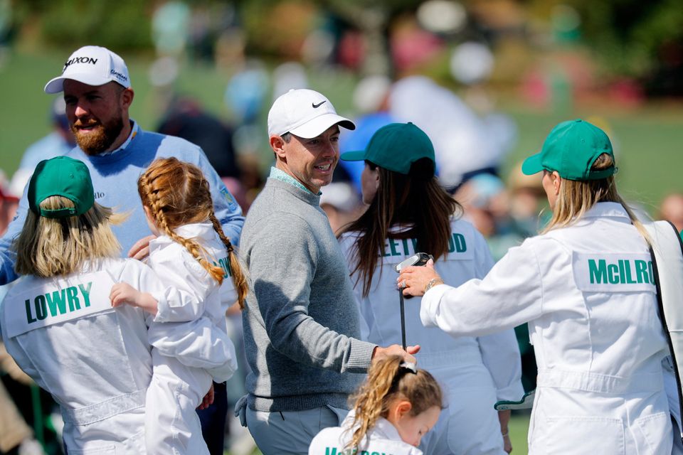 Golf - The Masters - Augusta National Golf Club, Augusta, Georgia, U.S. - April 8, 2026
Northern Ireland's Rory McIlroy reacts with his wife Erica Stoll and Ireland's Shane Lowry during the par 3 contest REUTERS/Mike Blake