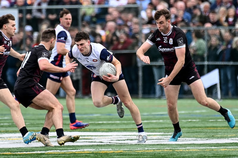 New York’s Donal Hunt is tackled by Paul Conroy of Galway. Photograph: Emily Harney/Inpho