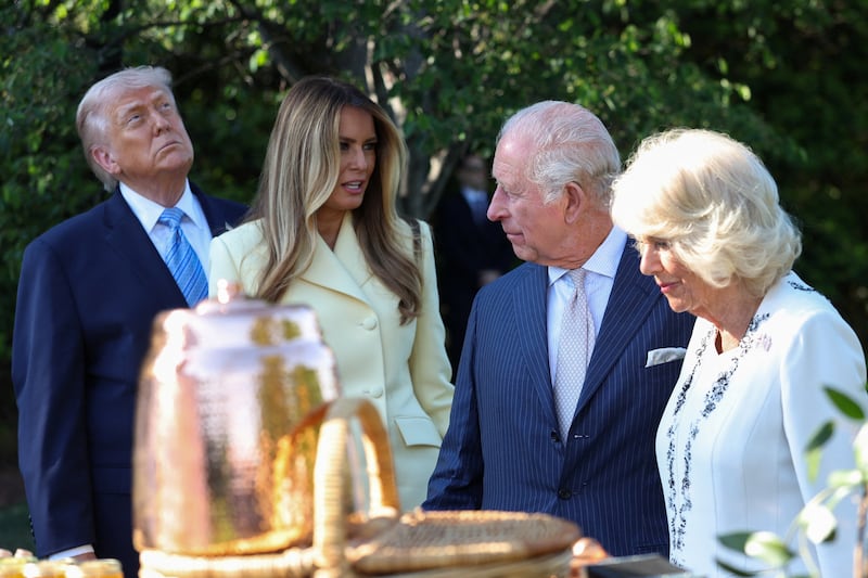 US president Donald Trump, first lady Melania Trump, Britain's King Charles and Queen Camilla tour the South Lawn at the White House on Monday. Photograph: Suzanne Plunkett-Pool/Getty Images