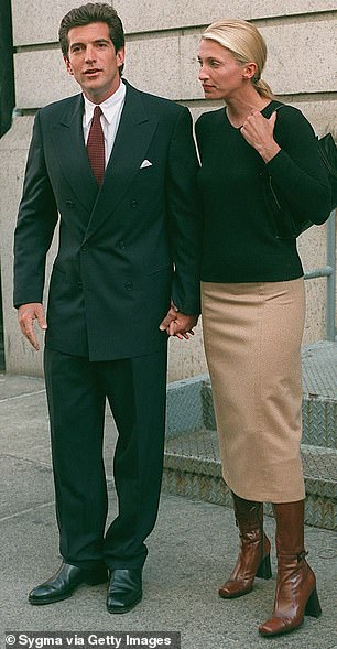 Carolyn's camel skirt and black jumper were photographed outside their Tribeca apartment in 1996