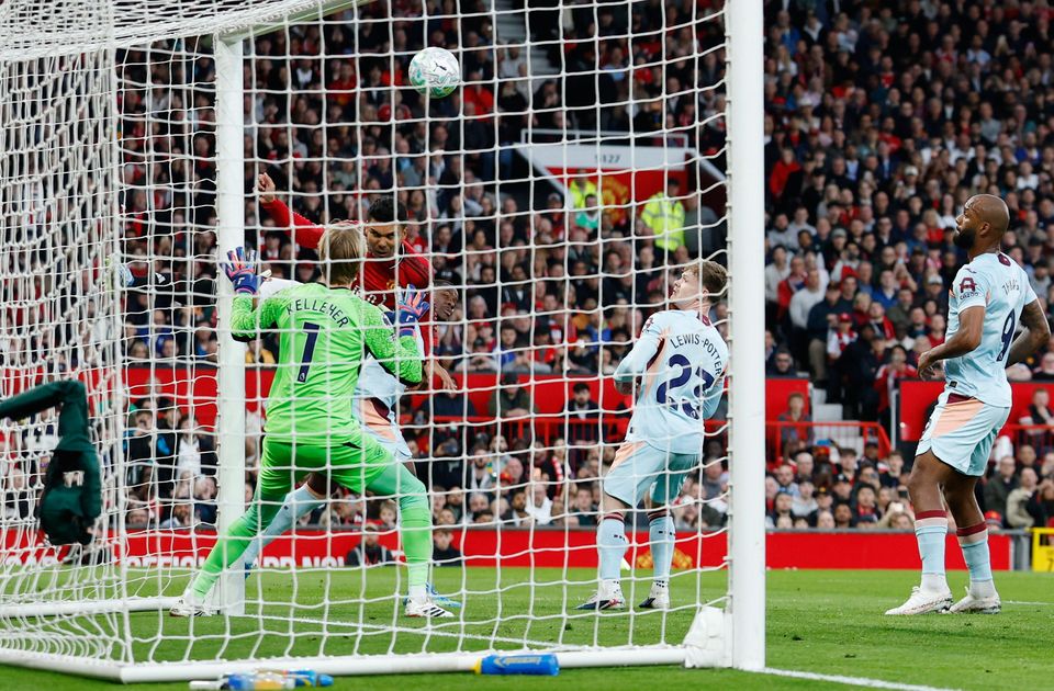 Manchester United's Casemiro scores their first goal past Brentford's Caoimhín Kelleher. Photo: Reuters