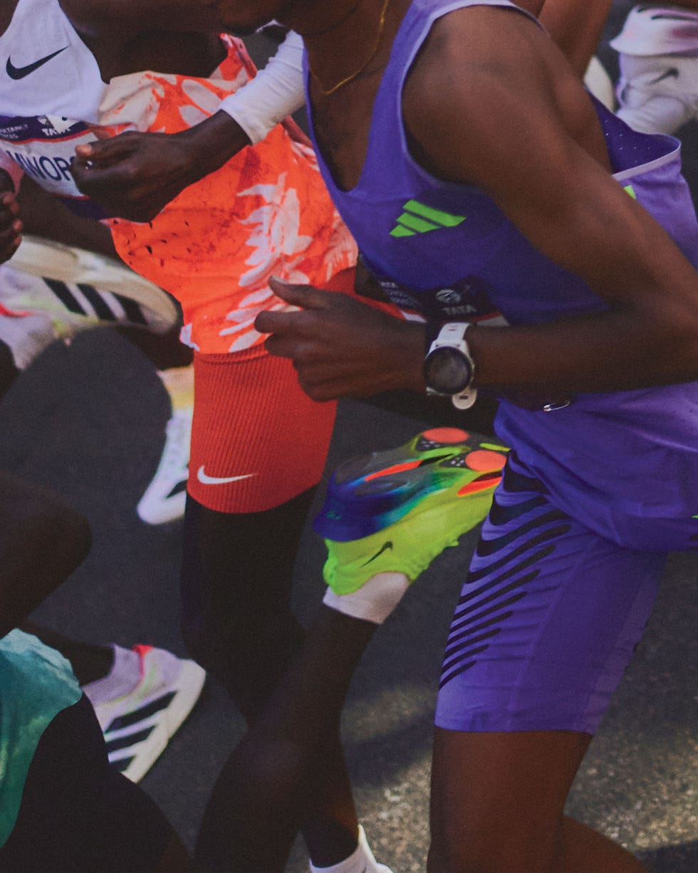 Runners in motion during a race, showcasing vibrant athletic attire.