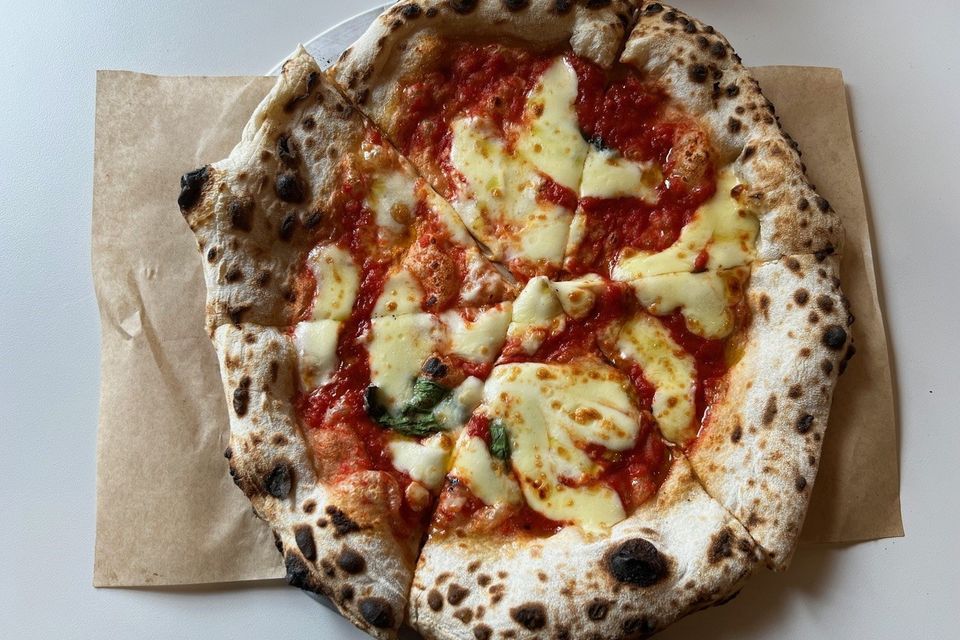 Pizza no.1 of crushed tomato sauce, fior de latte, basil oil. Photo: Lucinda O'Sullivan