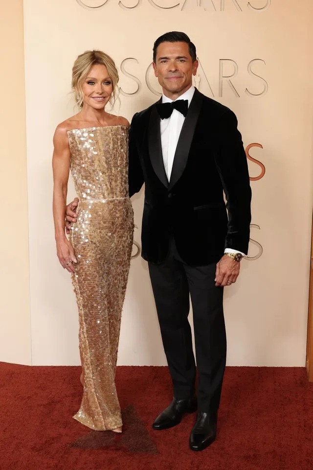 Kelly Ripa and Mark Consuelos attend the Oscars in Hollywood on March 15, 2026.Credit: Getty Images