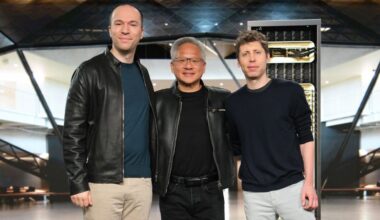 (L to R): OpenAI President Greg Brockman, NVIDIA Founder and CEO Jensen Huang, and OpenAI CEO Sam Altman are seen standing side by side.