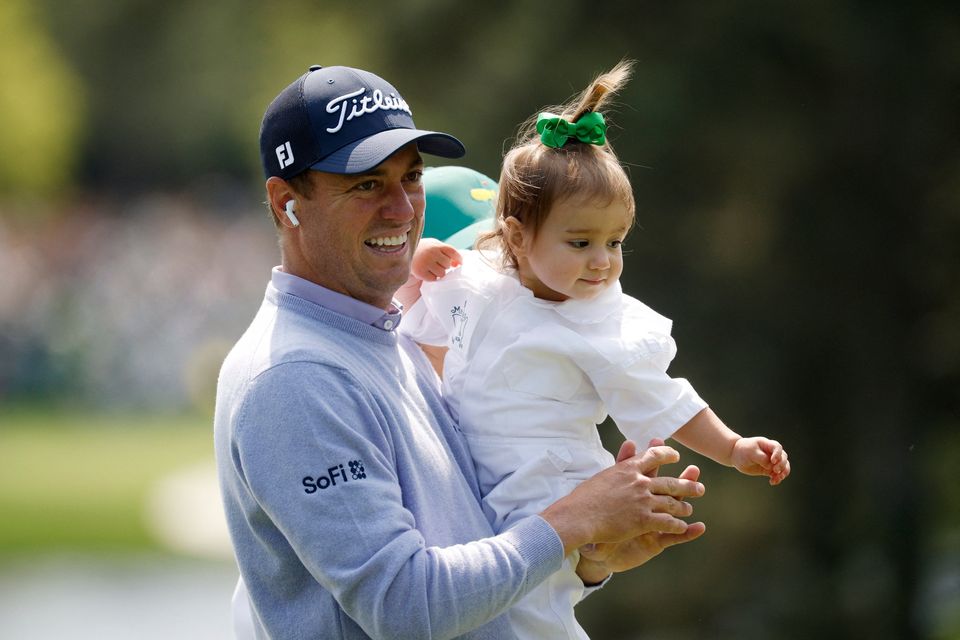 Golf - The Masters - Augusta National Golf Club, Augusta, Georgia, U.S. - April 8, 2026
Justin Thomas of the U.S. with his daughter Molly Thomas on the 2nd hole during the par 3 contest REUTERS/Brian Snyder