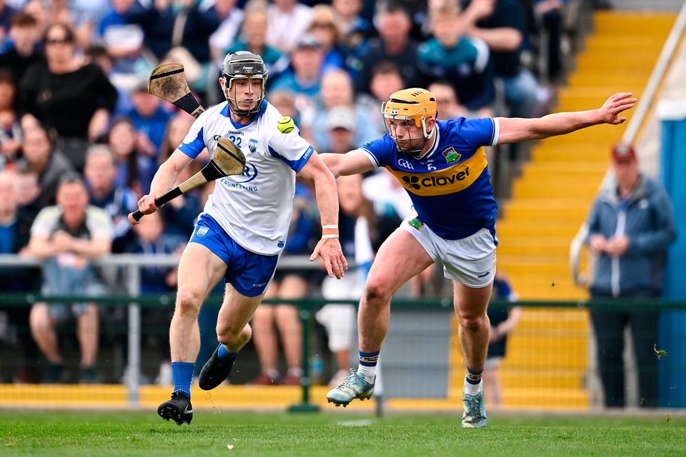 Kevin Mahony of Waterford gets away from Tipperary's Ronan Maher during yesterday's clash at Walsh Park. Photo: Ben McShane/Sportsfile