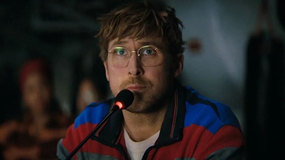  Ryan Gosling at a microphone in Project Hail Mary. 
