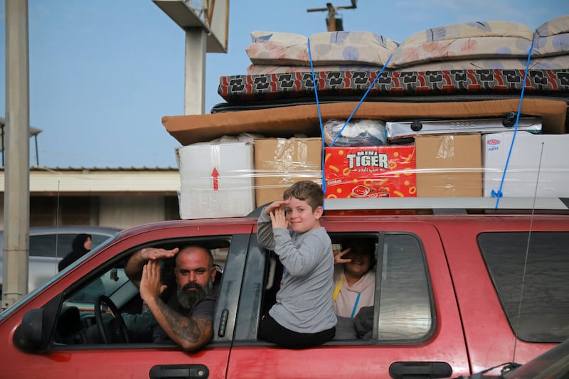 More displaced residents travel through the Qasmieh area in Lebanon on the way back to their homes on Friday after a 10-day ceasefire came into effect. Photograph by Ibrahim Amro/AFP via Getty 