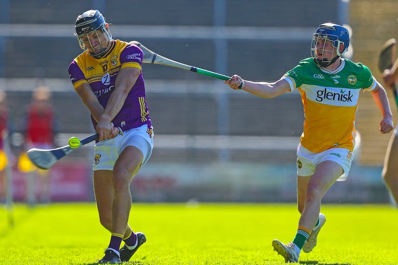 Offaly's Colin Spain tackles Jack O'Connor of Wexford. Photograph: Leah Scholes/Inpho