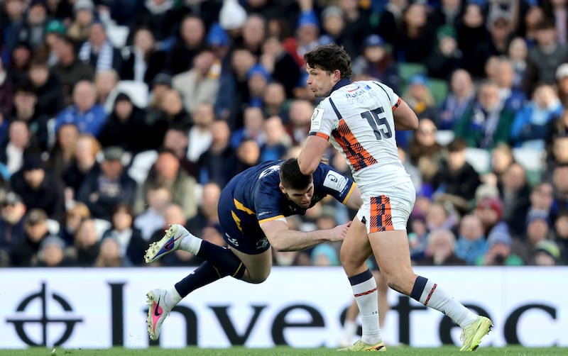 Leinster's Harry Byrne tackles Piers O'Conor of Edinburgh. Photograph: Bryan Keane/Inpho